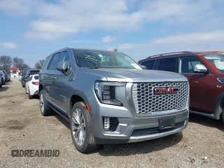 2023 GMC Yukon Denali with VIN 1GKS2DKL6PR231948, listed as a IAAI auction lot 41586428 with 69,458 mi miles. Bid and sale history available at carsss.com. Image 1.