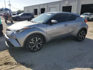 2018 Toyota C-HR XLE z VIN NMTKHMBX7JR052600, wystawiony jako Copart lot #58599785 z przebiegiem 71 144 mil mil oraz Szkoda całkowita • Salvage title. Historia ofert i sprzedaży dostępna na DreamBid. Obrazek 1.