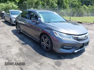 2016 Honda Accord Touring with VIN 1HGCR3F94GA009459, listed as a IAAI auction lot 42597128 with 182,977 mi miles and . Bid and sale history available at DreamBid. Image 6.