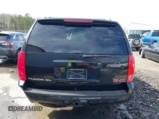2014 GMC Yukon XL SLT with VIN 1GKS2KE77ER199723, listed as a IAAI auction lot 41555112 with 215,436 mi miles. Bid and sale history available at carsss.com. Image 16.