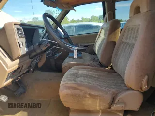1994 GMC Sierra 1500 with VIN 1GTEC19KXRE557960, listed as a Copart auction lot 71677974 with 194,641 mi miles and Salvage Title. Bid and sale history available at DreamBid. Image 7.