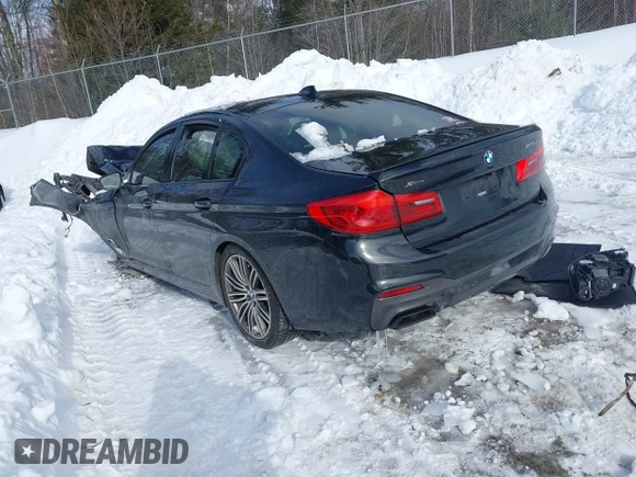 2020 BMW 5 Series M550i xDrive with VIN WBAJS7C00LCD91804, listed as a IAAI auction lot 41590368 with Not provided miles and . Bid and sale history available at DreamBid. Image 3.