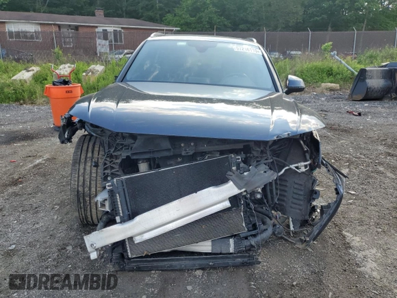 2018 Audi Q5 Premium Plus with VIN WA1BNAFY1J2086688, listed as a Copart auction lot 57216115 with 88,133 mi miles and Salvage title. Bid and sale history available at DreamBid. Image 5.