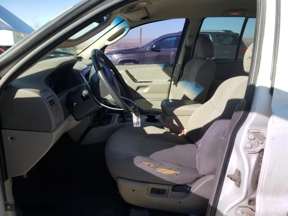 2002 Jeep Grand Cherokee Laredo with VIN 1J4GW48S72C298133, listed as a Copart auction lot 43973315 with 266,437 mi miles and Salvage Title. Bid and sale history available at carsss.com. Image 7.