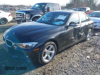 2015 BMW 3 Series 328i xDrive with VIN WBA3B3C57FF548161, listed as a IAAI auction lot 40383957 with 38,635 mi miles and . Bid and sale history available at DreamBid. Image 2.