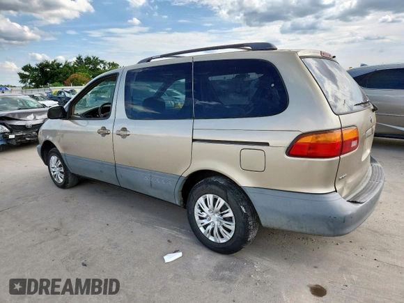 2000 Toyota Sienna LE with VIN 4T3ZF13C2YU218417, listed as a Copart auction lot 63328035 with 263,439 mi miles and Salvage title. Bid and sale history available at DreamBid. Image 2.