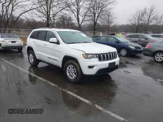 2020 Jeep Grand Cherokee Altitude with VIN 1C4RJFAG2LC237045, listed as a IAAI auction lot 41514039 with 82,859 mi miles. Bid and sale history available at carsss.com. Image 1.