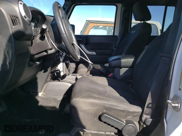 2016 Jeep Wrangler Unlimited 75th Anniversary with VIN 1C4HJWEG3GL185999, listed as a Copart auction lot 42060225 with 112,769 mi miles and Salvage title. Bid and sale history available at DreamBid. Image 7.