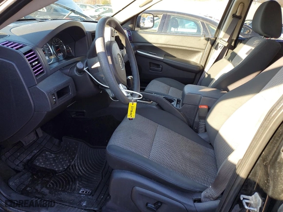 2008 Jeep Grand Cherokee Laredo with VIN 1J8GR48K28C165035, listed as a Copart auction lot 89260785 with 147,289 mi miles and Salvage Title. Bid and sale history available at carsss.com. Image 7.