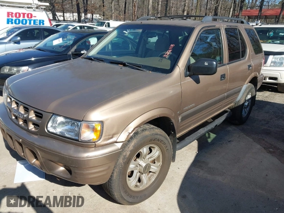 2001 Isuzu Rodeo S with VIN 4S2CK58W414322118, listed as a IAAI auction lot 41496624 with 244,189 mi miles and . Bid and sale history available at DreamBid. Image 2.