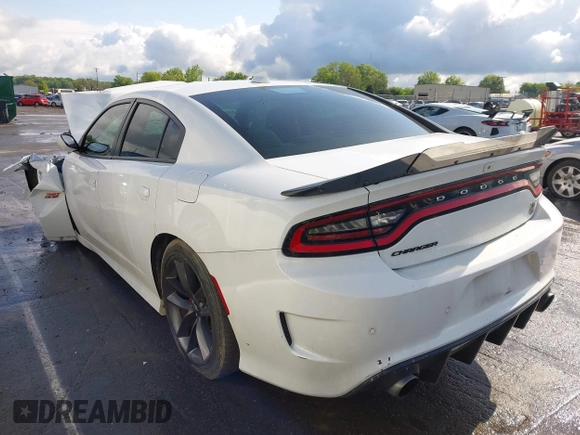 2019 Dodge Charger Scat Pack with VIN 2C3CDXGJ3KH558856, listed as a IAAI auction lot 42009847 with 62,546 mi miles and . Bid and sale history available at DreamBid. Image 3.