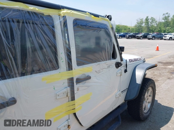 2015 Jeep Wrangler Unlimited Rubicon z VIN 1C4BJWFGXFL755810, wystawiony jako IAAI lot #42495531 z przebiegiem 109 668 mil mil oraz . Historia ofert i sprzedaży dostępna na DreamBid. Obrazek 6.