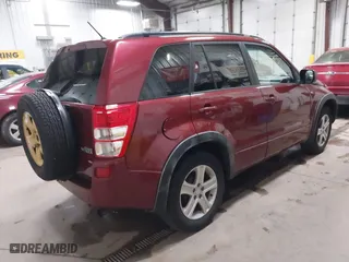 2006 Suzuki Grand Vitara Luxury with VIN JS3TD947264106126, listed as a IAAI auction lot 41961693 with 146,105 mi miles. Bid and sale history available at carsss.com. Image 4.