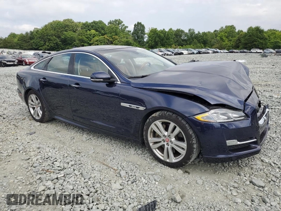 2017 Jaguar XJ R-Sport with VIN SAJWA1C70H8W05558, listed as a Copart auction lot 59759165 with 102,230 mi miles and Salvage title. Bid and sale history available at DreamBid. Image 4.