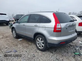2009 Honda CR-V EX-L with VIN JHLRE487X9C021566, listed as a IAAI auction lot 42008321 with 128,647 mi miles and . Bid and sale history available at carsss.com. Image 3.