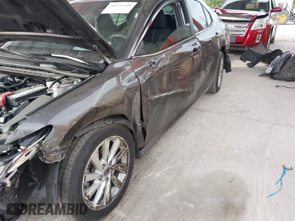 2023 Toyota Camry LE z VIN 4T1C11AK3PU719452, wystawiony jako IAAI lot #38236100 z przebiegiem 34 140 mil mil oraz . Historia ofert i sprzedaży dostępna na DreamBid. Obrazek 12.
