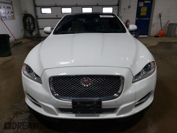 2015 Jaguar XJ with VIN SAJWJ1CD3F8V89374, listed as a Copart auction lot 49416114 with 94,636 mi miles and . Bid and sale history available at DreamBid. Image 5.