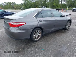 2015 Toyota Camry XLE with VIN 4T1BF1FK3FU114111, listed as a IAAI auction lot 41988719 with 133,761 mi miles and . Bid and sale history available at DreamBid. Image 4.