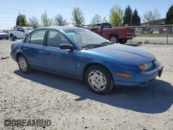 2001 Saturn SL z VIN 1G8ZK547X1Z294553, wystawiony jako Copart lot #53786805 z przebiegiem 288 011 mil mil oraz Szkody całkowita. Historia ofert i sprzedaży dostępna na DreamBid. Obrazek 4.