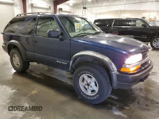 1999 Chevrolet Blazer LS с VIN 1GNCT18W9XK157387, выставлен на аукционе Copart как лот 49667765 с пробегом 182 411 миль миль и Списание • Salvage title. История ставок и продаж доступна на DreamBid. Изображение 4.
