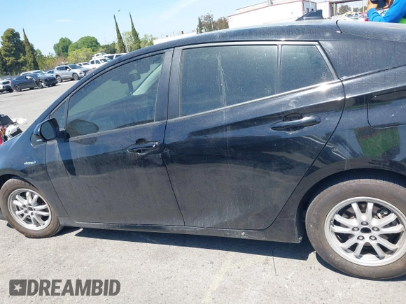 2019 Toyota Prius L Eco with VIN JTDKARFU0K3087064, listed as a IAAI auction lot 41986365 with 81,735 mi miles. Bid and sale history available at carsss.com. Image 14.