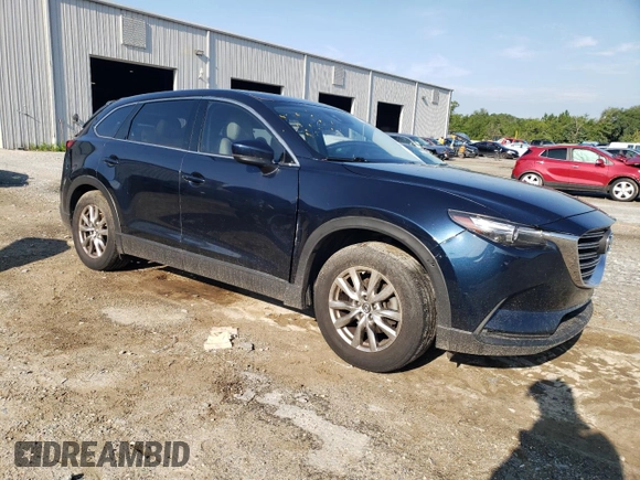 2017 Mazda CX-9 Touring with VIN JM3TCACY7H0140268, listed as a Copart auction lot 60982885 with 157,656 mi miles and Salvage title. Bid and sale history available at DreamBid. Image 4.