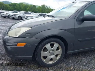 2002 Ford Focus ZX3 with VIN 3FAFP31322R232138, listed as a IAAI auction lot 42253174 with 178,405 mi miles and . Bid and sale history available at DreamBid. Image 13.