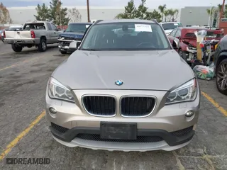 2015 BMW X1 xDrive28i with VIN WBAVL1C55FVY41749, listed as a IAAI auction lot 40977221 with 120,924 mi miles. Bid and sale history available at carsss.com. Image 12.