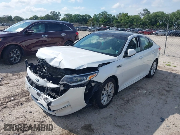 2016 Kia Optima EX z VIN 5XXGU4L31GG064220, wystawiony jako IAAI lot #39443639 z przebiegiem 98 808 mil mil oraz . Historia ofert i sprzedaży dostępna na DreamBid. Obrazek 2.