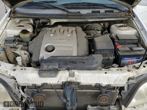2002 Kia Sedona LX with VIN KNDUP131326271237, listed as a Copart auction lot 89358515 with 142,150 mi miles and Salvage Title. Bid and sale history available at carsss.com. Image 12.