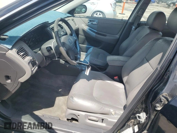 2002 Honda Accord EX z VIN 1HGCG16582A057594, wystawiony jako Copart lot #54874665 z przebiegiem 173 709 mil mil oraz Szkoda całkowita • Salvage title. Historia ofert i sprzedaży dostępna na DreamBid. Obrazek 7.