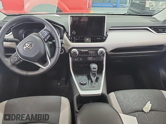 2023 Toyota RAV4 Hybrid XLE with VIN 2T3RWRFV9PW175446, listed as a IAAI auction lot 42806880 with 90,261 mi miles and . Bid and sale history available at DreamBid. Image 2.