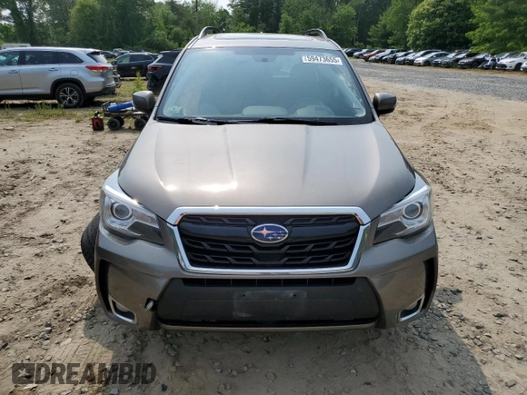 2017 Subaru Forester Touring with VIN JF2SJGWC6HH542119, listed as a Copart auction lot 59473655 with Not provided miles and Salvage title. Bid and sale history available at DreamBid. Image 5.