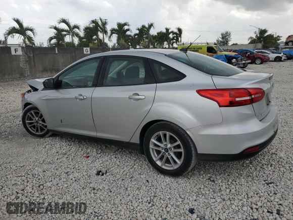 2018 Ford Focus SE with VIN 1FADP3F28JL256318, listed as a Copart auction lot 55524544 with 136,723 mi miles and Salvage title. Bid and sale history available at DreamBid. Image 2.