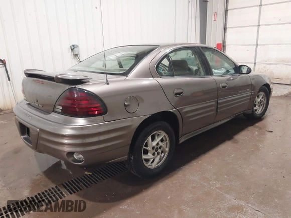 2002 Pontiac Grand Am SE1 z VIN 1G2NF52FX2C128240, wystawiony jako IAAI lot #41356415 z przebiegiem 15 900 mil mil oraz . Historia ofert i sprzedaży dostępna na DreamBid. Obrazek 4.