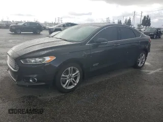 2015 Ford Fusion Energi Titanium with VIN 3FA6P0SU4FR214722, listed as a Copart auction lot 47781985 with 124,573 mi miles and Salvage Title. Bid and sale history available at carsss.com. Image 1.
