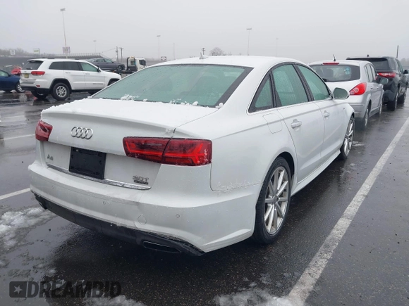 2018 Audi A6 Premium Plus with VIN WAUG3AFC6JN067023, listed as a IAAI auction lot 41502341 with 132,440 mi miles and . Bid and sale history available at DreamBid. Image 4.