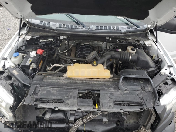 2015 Ford F-150 XLT with VIN 1FTFX1EF9FFA42214, listed as a Copart auction lot 56384325 with 121,911 mi miles and Salvage title. Bid and sale history available at DreamBid. Image 11.