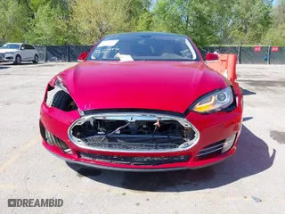 2014 Tesla Model S 60 kWh Battery with VIN 5YJSA1H1XEFP38289, listed as a IAAI auction lot 42092052 with 75,668 mi miles. Bid and sale history available at carsss.com. Image 13.