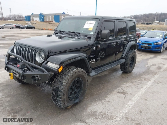 2018 Jeep Wrangler Unlimited Sahara with VIN 1C4HJXEG5JW165345, listed as a IAAI auction lot 41555392 with 99,010 mi miles. Bid and sale history available at carsss.com. Image 19.