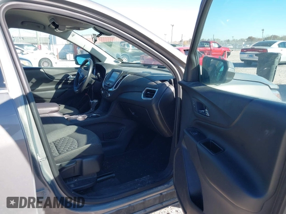 2018 Chevrolet Equinox LT z VIN 3GNAXSEV7JS621706, wystawiony jako IAAI lot #40760827 z przebiegiem 36 051 mil mil oraz . Historia ofert i sprzedaży dostępna na DreamBid. Obrazek 5.