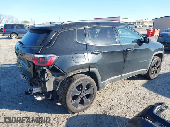 2019 Jeep Compass Latitude with VIN 3C4NJDBB1KT661261, listed as a IAAI auction lot 41883403 with 207,304 mi miles and . Bid and sale history available at DreamBid. Image 4.