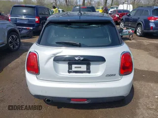 2016 MINI Hardtop 4 Door z VIN WMWXU1C54G2A93779, wystawiony jako IAAI lot #41933339 z przebiegiem 85 000 mil mil oraz . Historia ofert i sprzedaży dostępna na DreamBid. Obrazek 16.