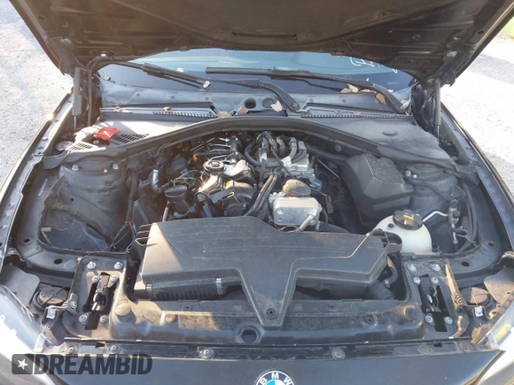 2015 BMW 2 Series 228i with VIN WBA1F5C58FV257021, listed as a IAAI auction lot 41318026 with 154,906 mi miles. Bid and sale history available at carsss.com. Image 10.