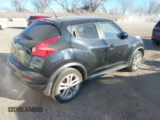 2013 Nissan Juke SV with VIN JN8AF5MV1DT215840, listed as a IAAI auction lot 41291261 with 151,086 mi miles and . Bid and sale history available at carsss.com. Image 4.