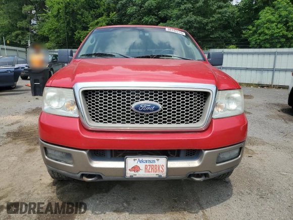 2004 Ford F-150 XLT with VIN 1FTPW14504KD65703, listed as a Copart auction lot 58792215 with 303,083 mi miles and Salvage title. Bid and sale history available at DreamBid. Image 5.