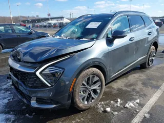 2023 Kia Sportage SX-Prestige with VIN KNDPXCAG5P7038476, listed as a IAAI auction lot 41532005 with 14,151 mi miles and . Bid and sale history available at DreamBid. Image 17.