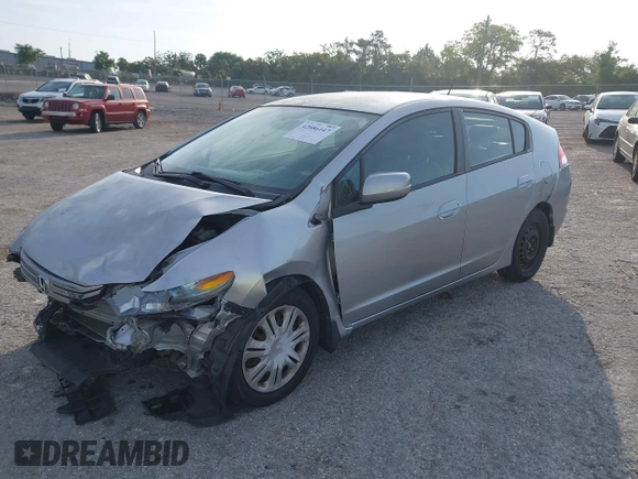 2010 Honda Insight LX with VIN JHMZE2H55AS039854, listed as a IAAI auction lot 42086147 with 153,555 mi miles and . Bid and sale history available at DreamBid. Image 2.