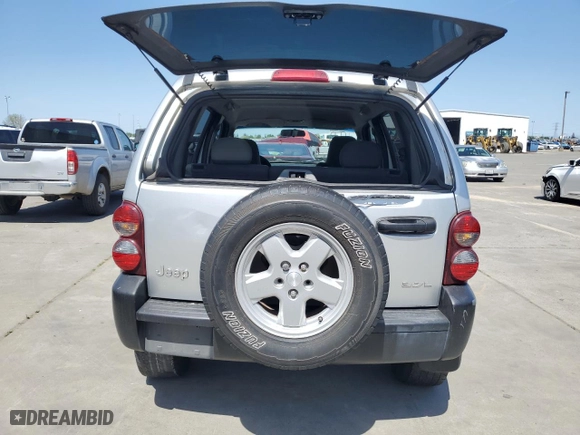 2005 Jeep Liberty Sport with VIN 1J4GK48K95W682154, listed as a Copart auction lot 52176155 with 164,743 mi miles and Salvage Title. Bid and sale history available at carsss.com. Image 6.