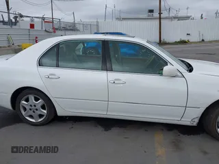 2005 Lexus LS 430 z VIN JTHBN36FX50175532, wystawiony jako IAAI lot #41925866 z przebiegiem 182 956 mil mil oraz . Historia ofert i sprzedaży dostępna na DreamBid. Obrazek 13.